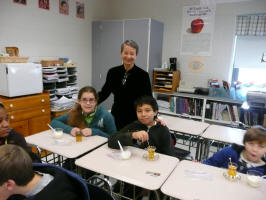 Chris Fogler with her school children at TOIS