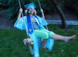 Maj's graduation presents... anklet from Carol, roses from Grace, and swing from Tim and Patty!